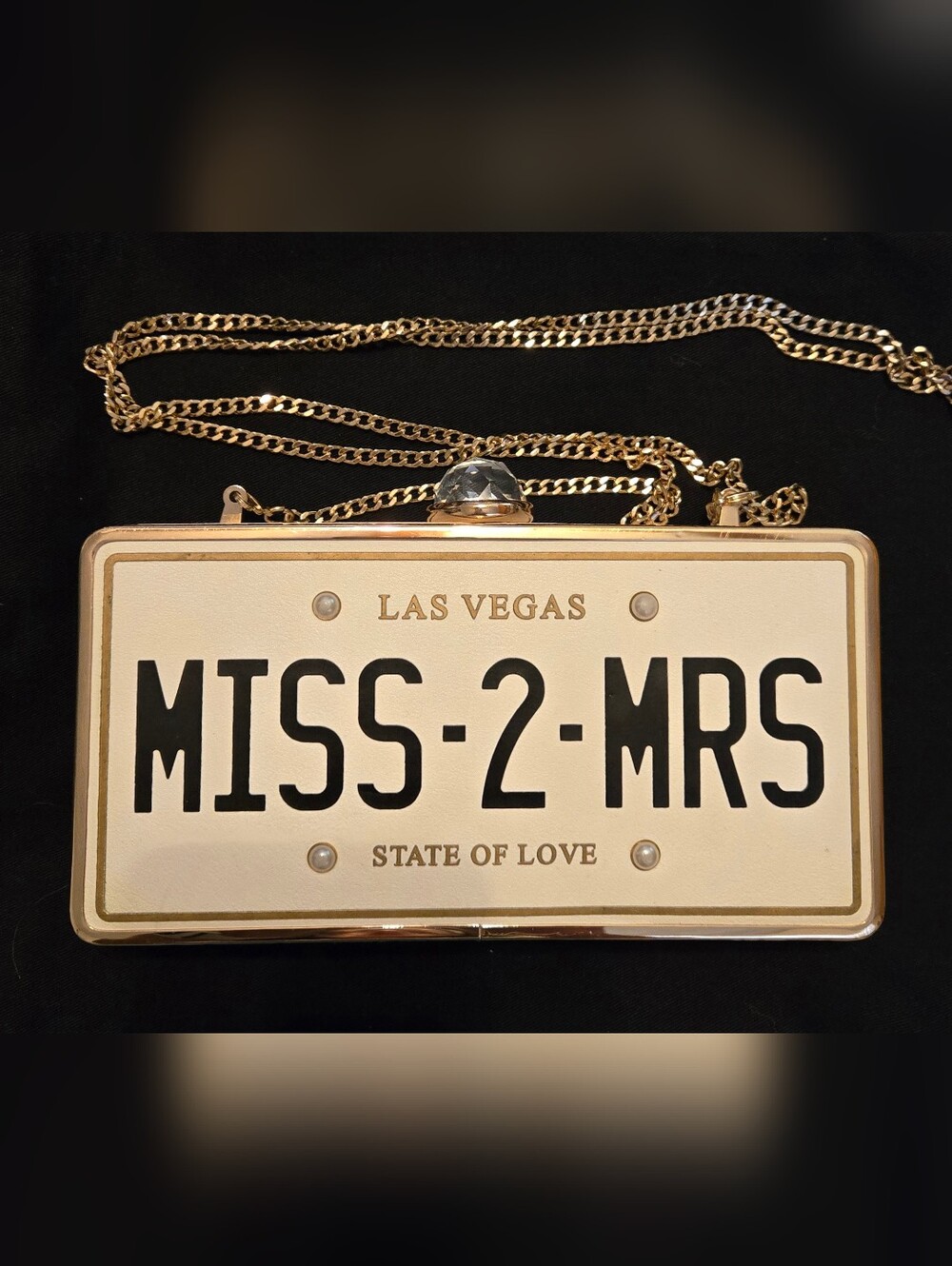 Aldo Cream and Gold 'MISS-2-MRS' License Plate Clutch